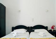Chambre triple avec lits simples